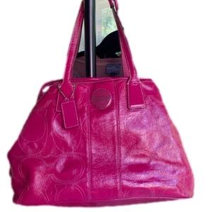 COACH handbag. Hot pink bag with silver details.